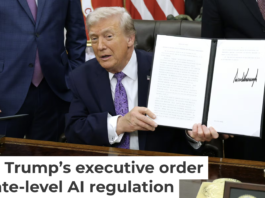 President Donald Trump displays his executive order countering state laws regulating AI. Alex Wong/Getty Images